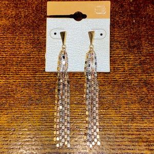 Buckle brand, long dangle, gold/silver earrings. Gently used. Very cute. $7